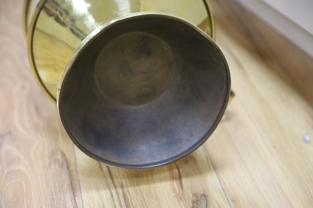 An Aesthetic movement brass communion jug, c.1870, height 49cm
